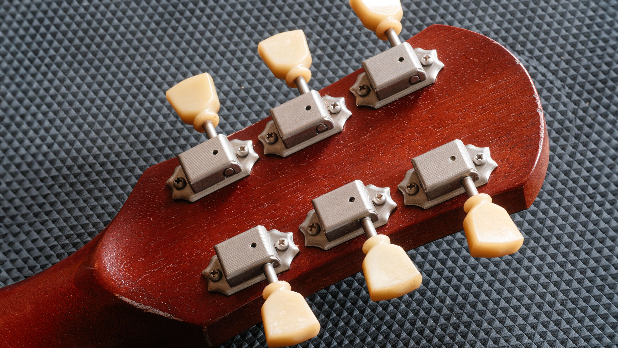 Fixes to make if your new guitar doesn't sound right: from tuners to tremolo units, nuts and string trees, many new guitars need some TLC to make them sound at their best.